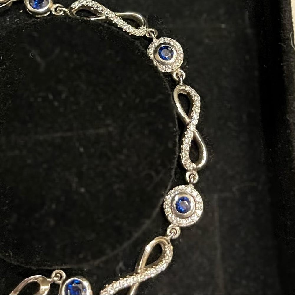 Beautiful silver bracelet with diamond and zircon stones.